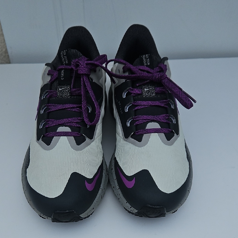 Nike Women's Sneakers with Purple and Black Accents